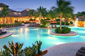 The rosort style swimming pool at The Player's Club is one of many ammenities available to thise who live in Lely Resort; a community locared in South Naples.